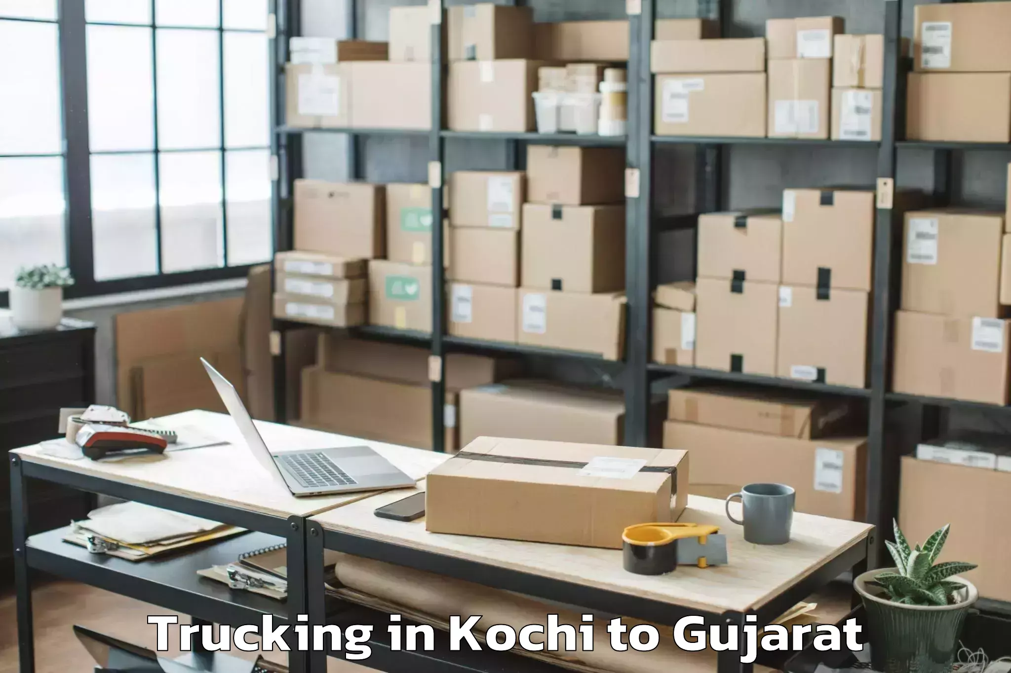 Book Kochi to Thasra Trucking